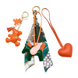 Oprah's Favorite Things - Green/Orange Bag Charm Set